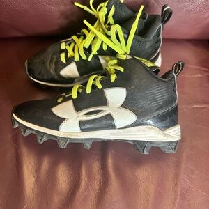 Under Armour Black and White High-Top football cleats